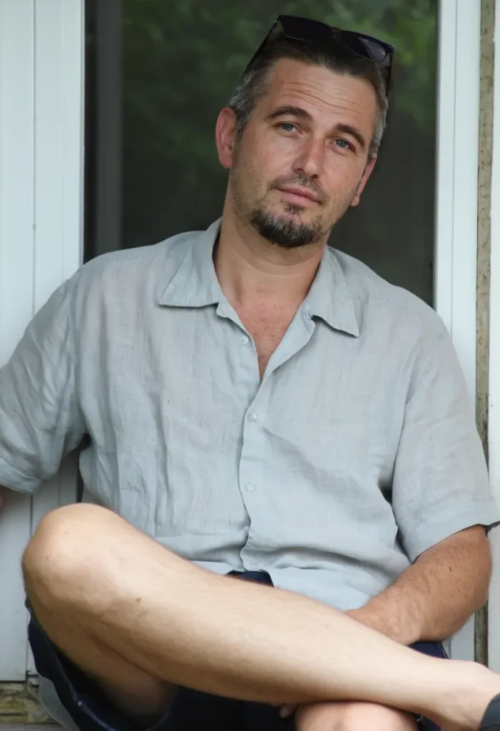 Николай